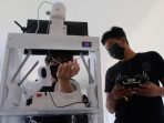 Robot Pembantu Penanganan Covid-19 Diuji Coba di Bali