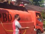 Cegah Covid-19, Polisi Semprot Disinfektan
