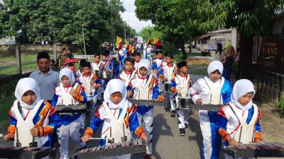 Gelar Acara Perpisahan dan Kenaikan Kelas, Madrasah Miftahul Islamiyah Jimbaran Tampilkan Pawai Drum Band