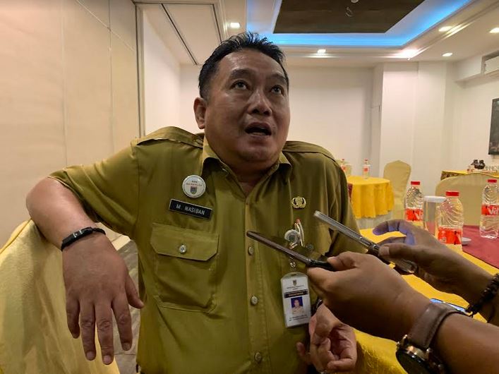Kepala Bidang Pengendalian Penduduk & Keluarga Berencana Dinsos P3AP2KB Mokhamad Nasiban